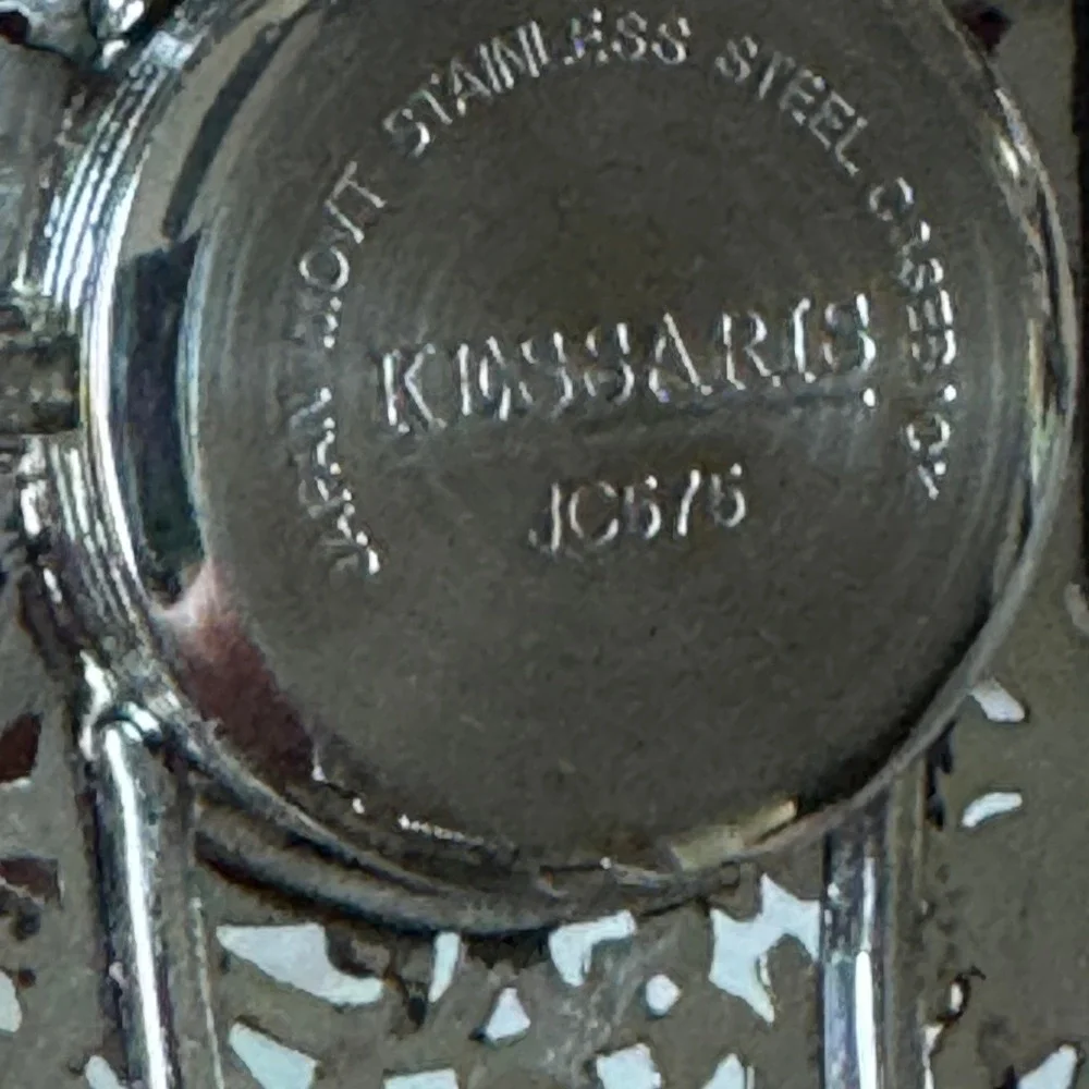 Kessaris Womens Silver Tone Filigree Cuff Watch and Matching Bangle Bracelet Set